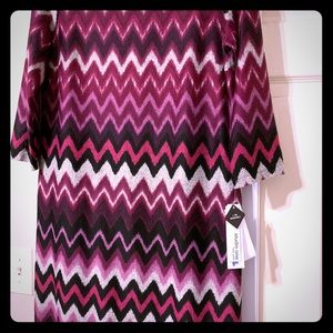Fall is here! This dress will go great with boots.